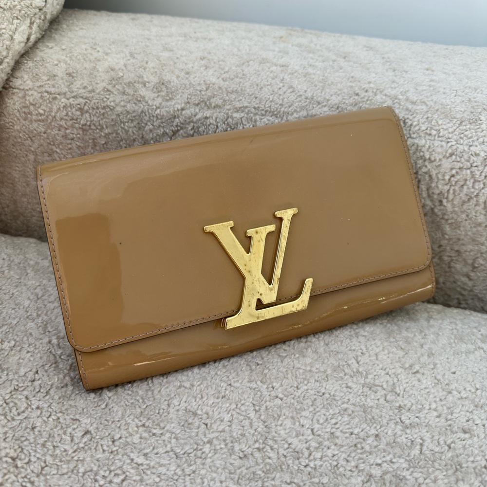 Louis Vuitton Gold Logo Tan Clutch
